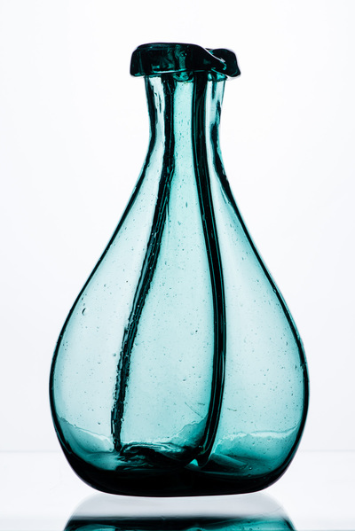 Aqua two-chambered vase, bulbous like a flower. Lots of glass bubbles.