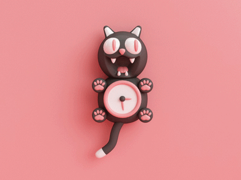 a cat clock — it’s eyes and tail are moving to indicate waiting